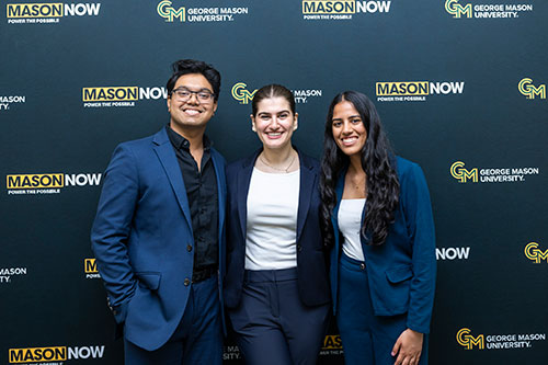 Three people smiling