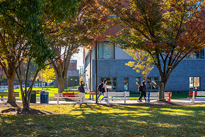 Students walking on campus. Links to Donor-Advised Fund story